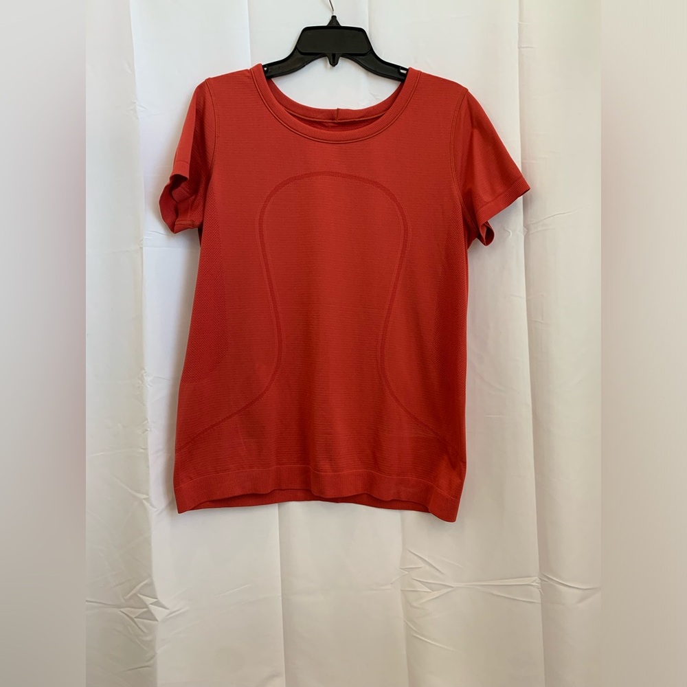 Women’s size L Lululemon orange shirt
